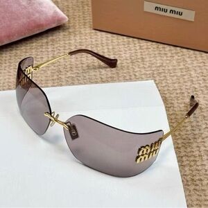 Miu Miu Gold Frame Sunglasses with Brown Tint